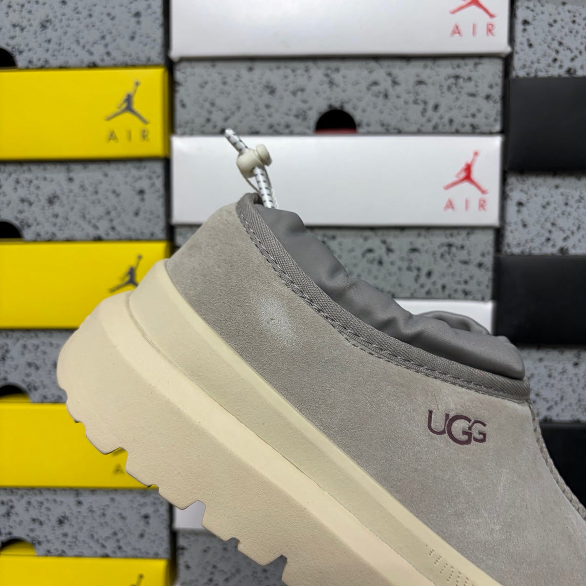 UGG Neumeel Deco Slip-On – Suede Moccasin Sneaker with Cream Lug Sole & Reflective Drawstring in Grey